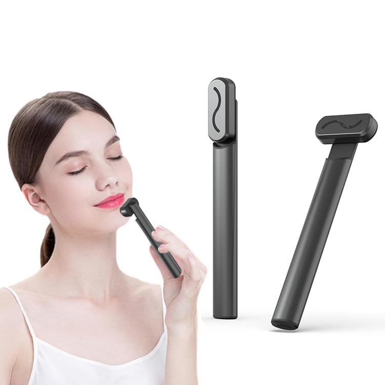 Red light eye care wand with warming and sonic vibration