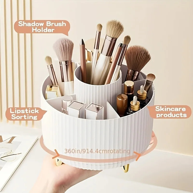 A white ribbed rotating makeup organizer held by a hand, filled with makeup brushes, pencils, compact powders, and skincare bottles. Text callouts read 'Shadow Brush Holder,' 'Lipstick Sorting,' 'Skincare products,' and '360° rotating.