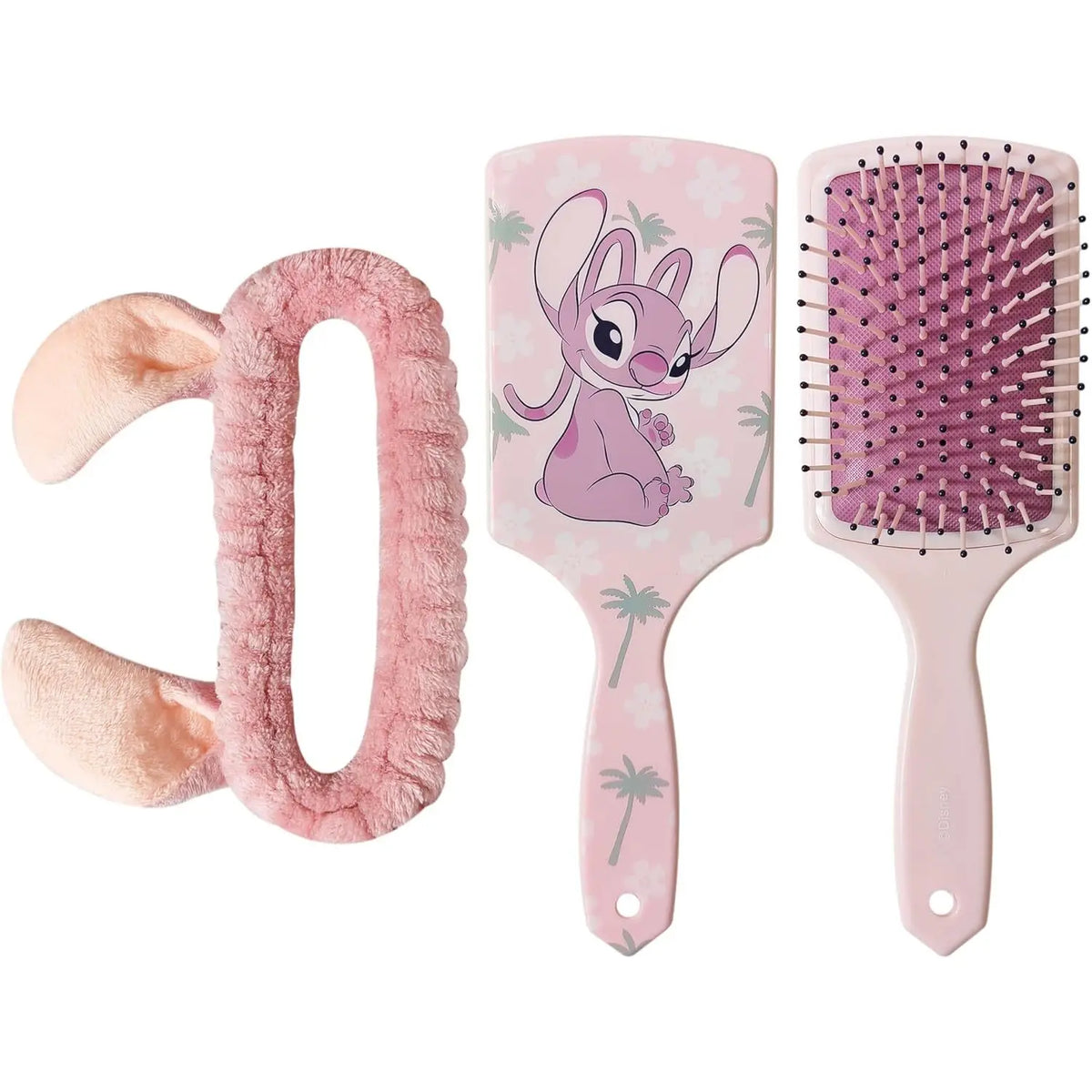 A pink hairbrush set featuring a plush bunny-shaped hair tie, a decorative paddle hairbrush with Stitch artwork, and a standard paddle hairbrush with pink bristles, all on a white background.
