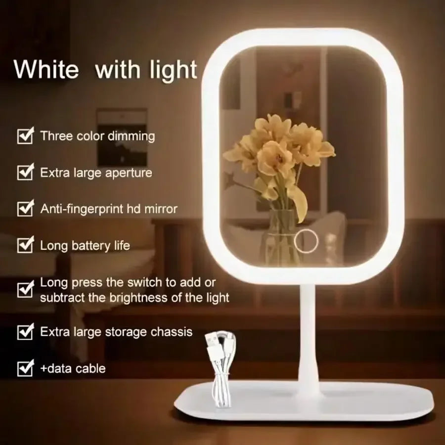 Lighted makeup mirror with convenient storage base